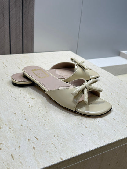 CD Dior Bow Slides Beige Leather 884659
